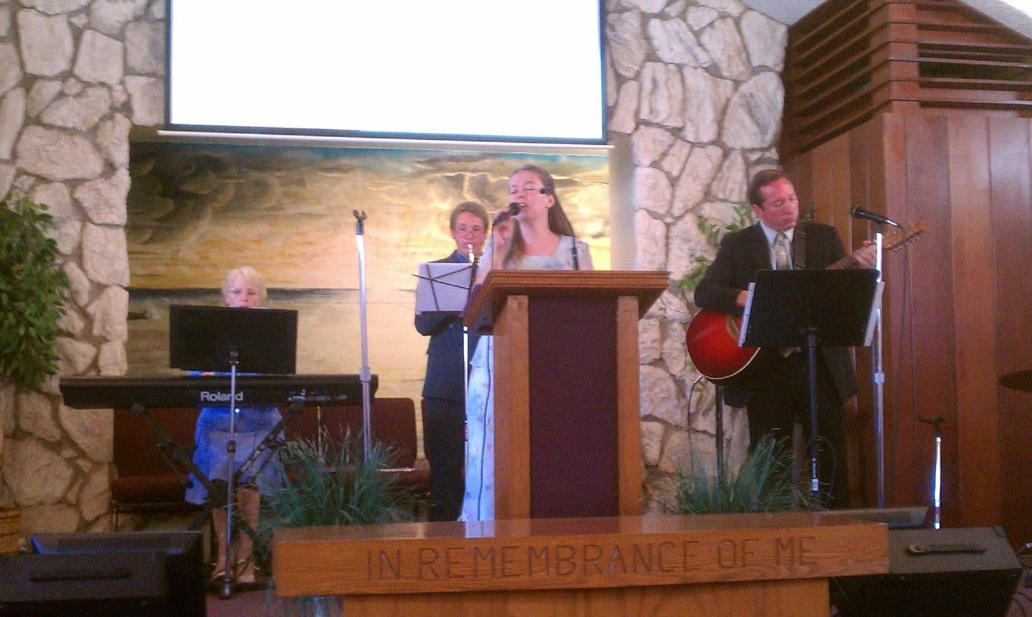 Musicians leading worship inside Cornerstone Church.